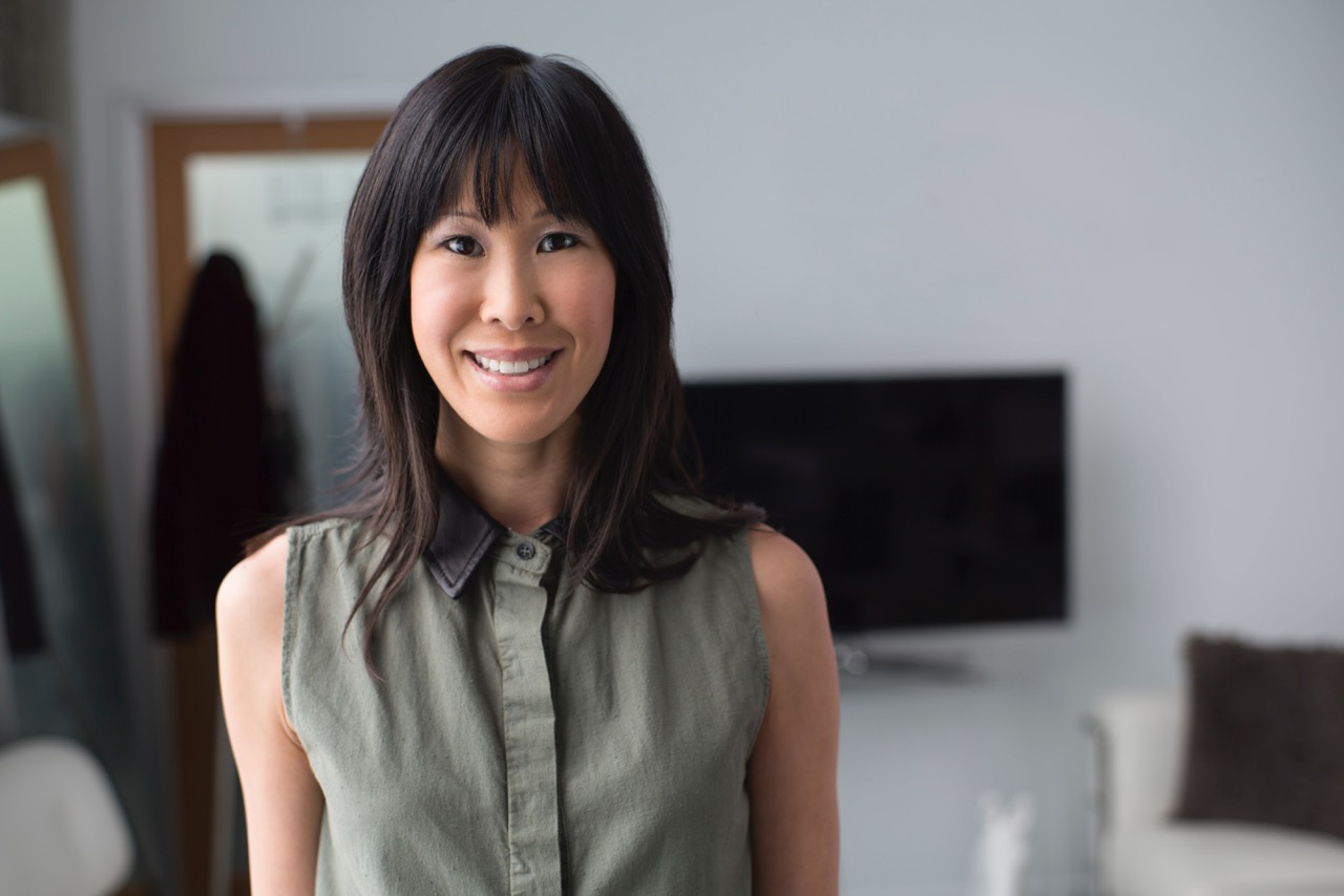 Laura Ling head shot, she is wearing a green button up shirt. 